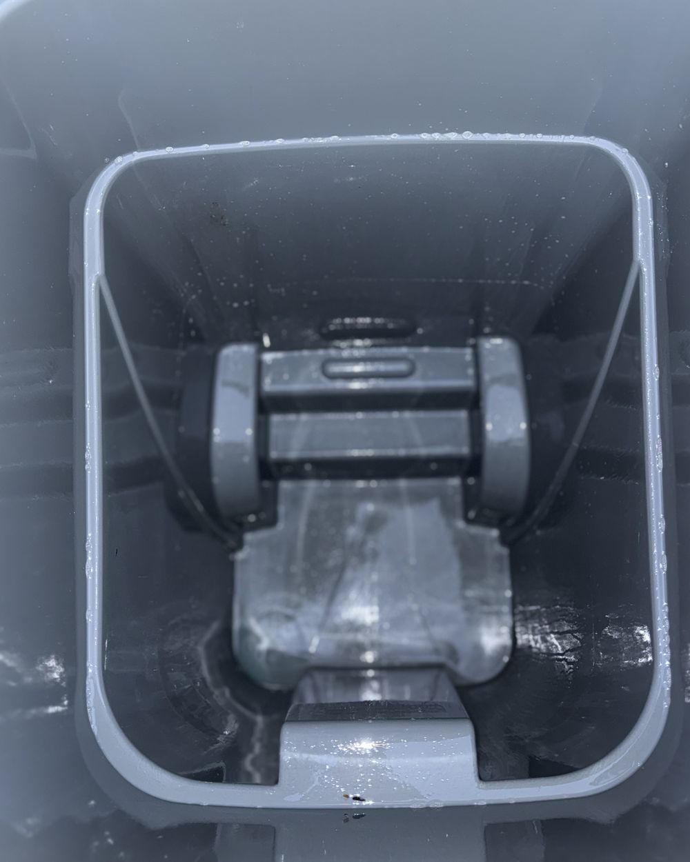 The same bin after cleaning, clean and rinsed inside.